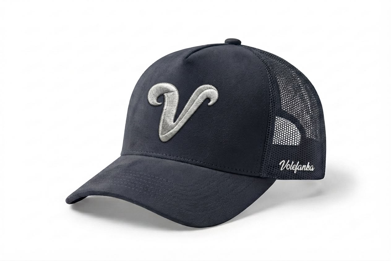 Voléfanka trucker cap in navy, silver V on the front panel